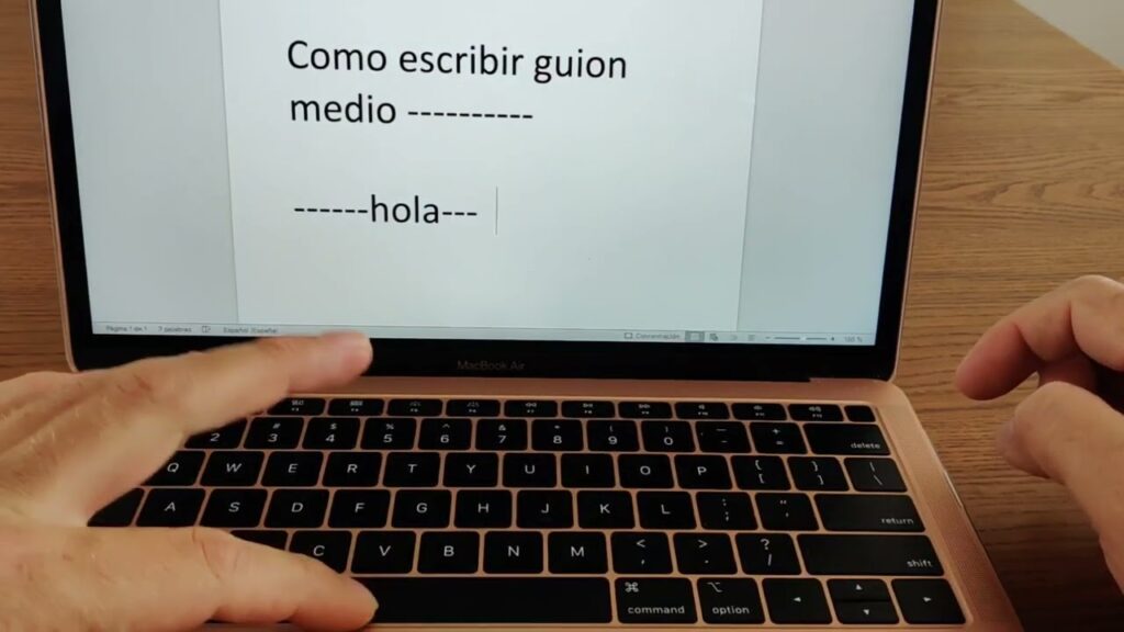 como poner guión largo en laptop